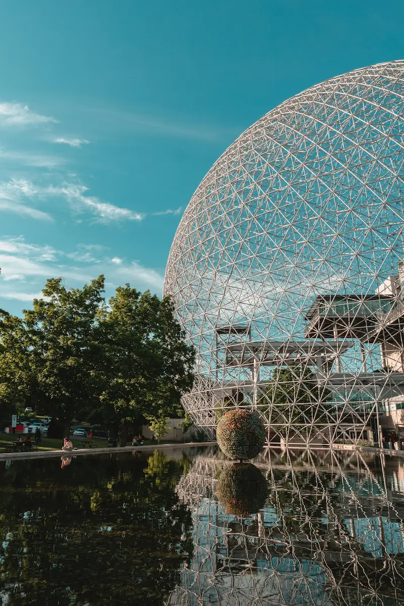 Montreal Biosphere geodesic dome reflected in water on Île Sainte-Hélène