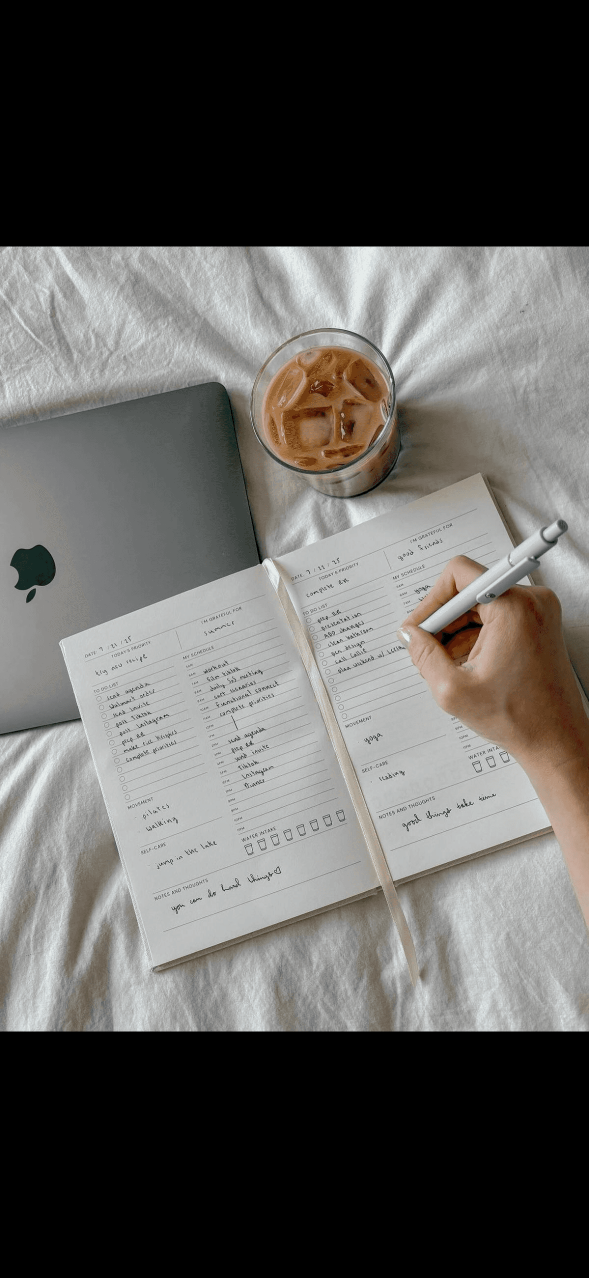 Golden sunlight illuminates rugged mountain peaks at dawn.