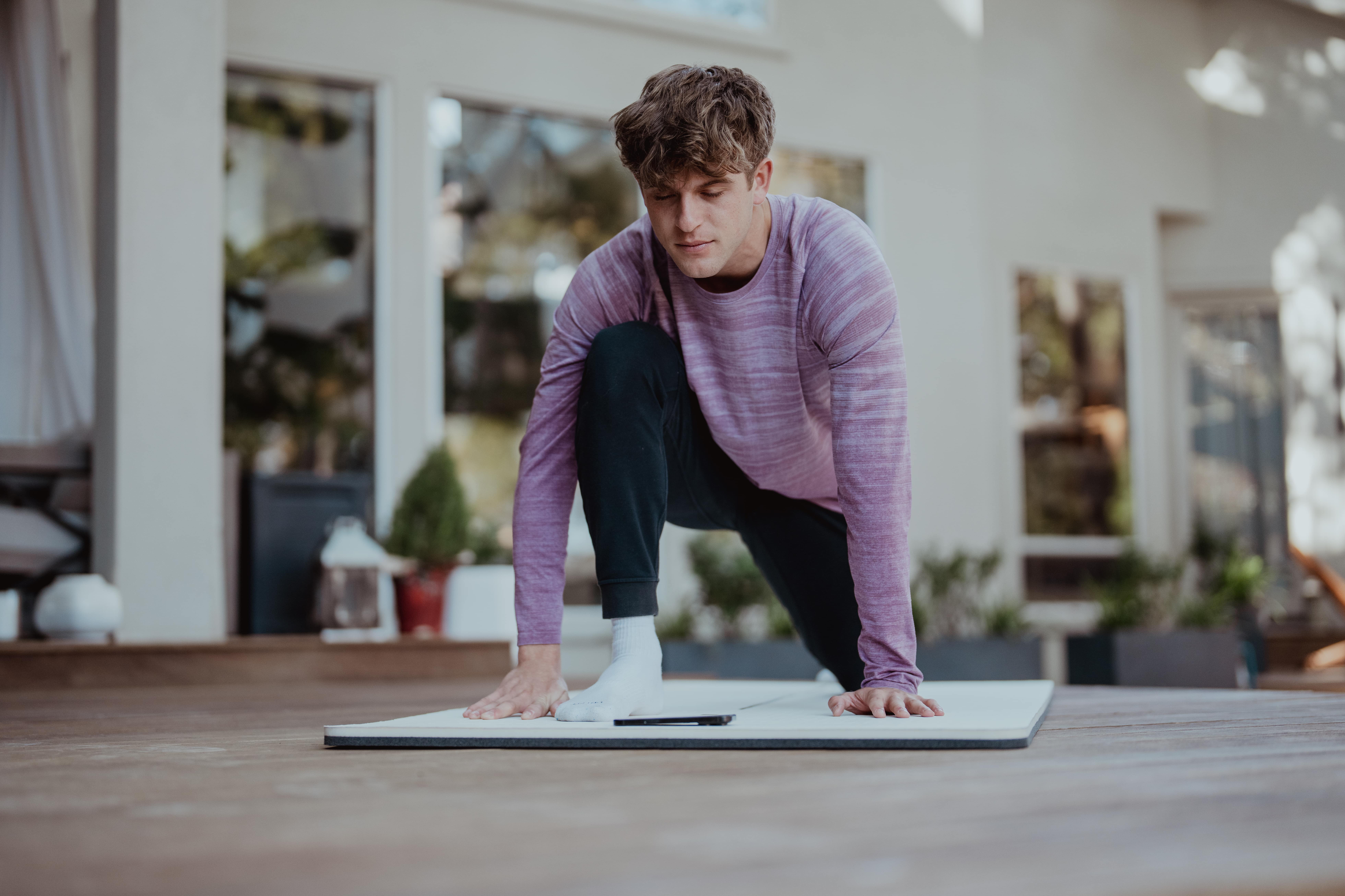 person working out - Best Corporate Wellness Software