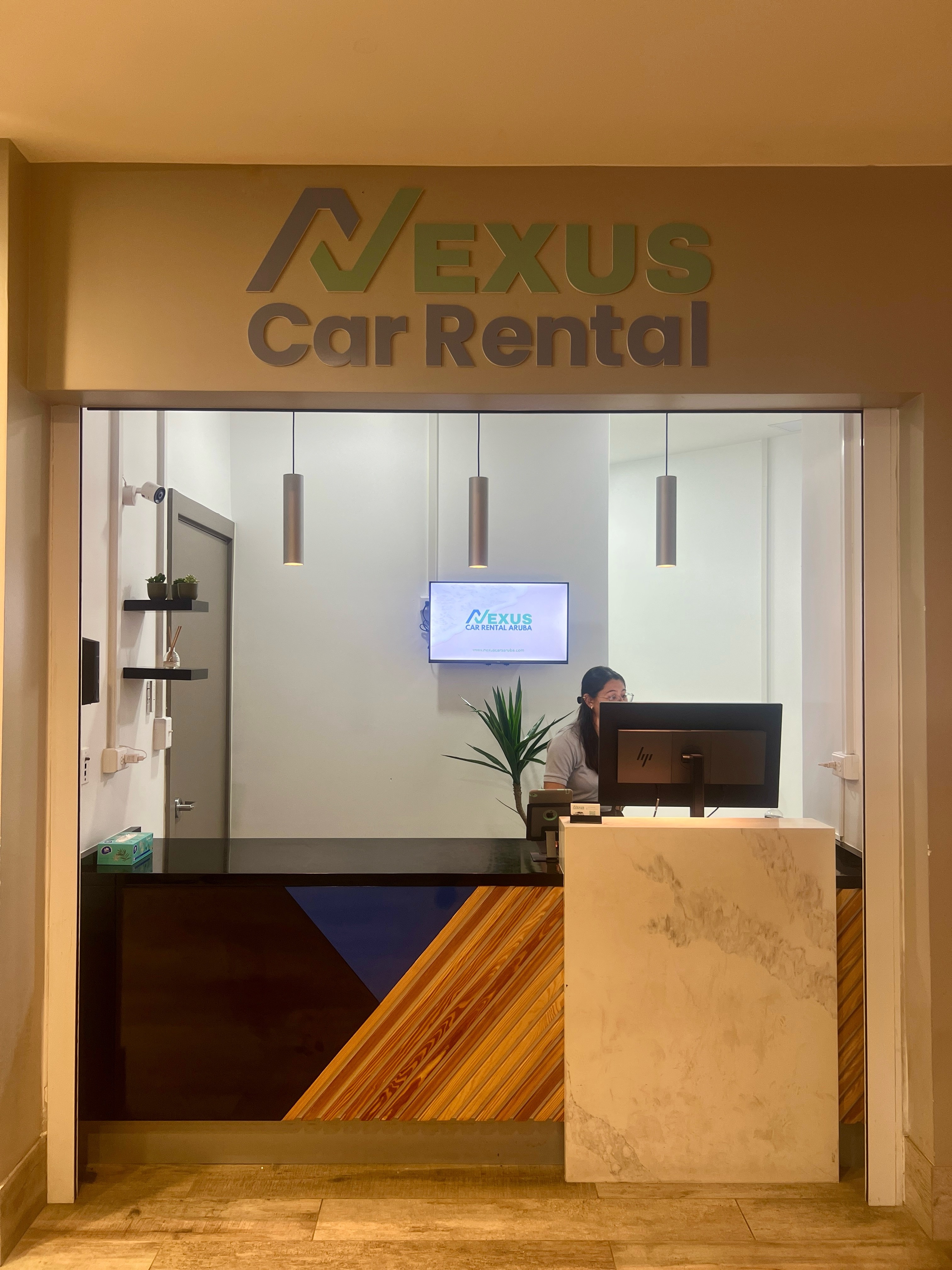 pink flamingo on body of water during daytime