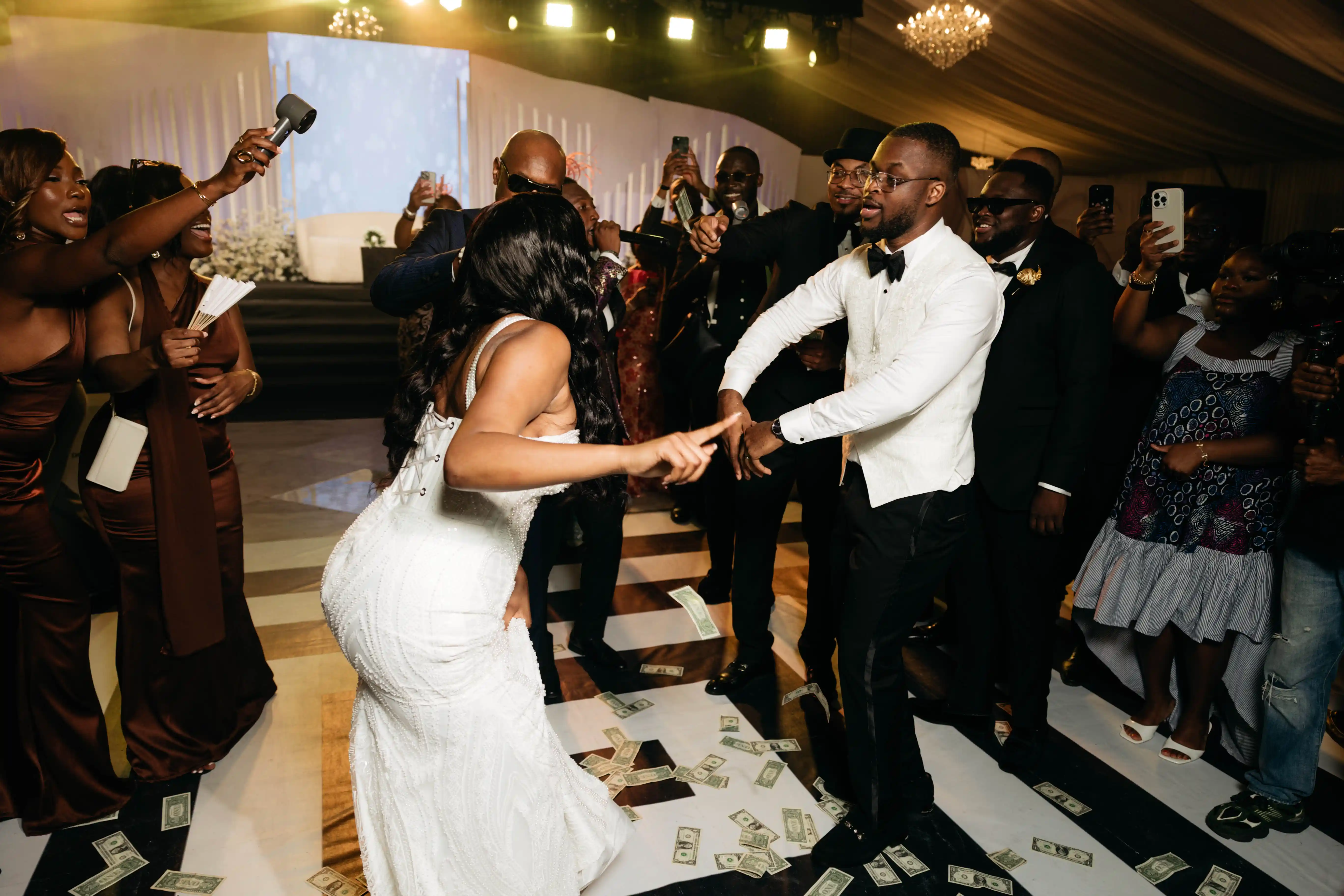 Bride and groom celebrating a luxury wedding coordinated by Victoria Brooks Events, a premium wedding planner in Nigeria.