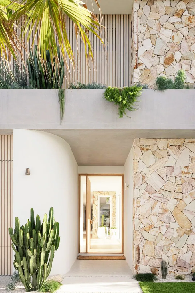 kids lying on a glass land and smiling