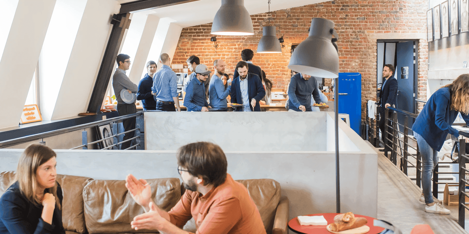 Open office landscape with employees working for recruiters showing workplace culture