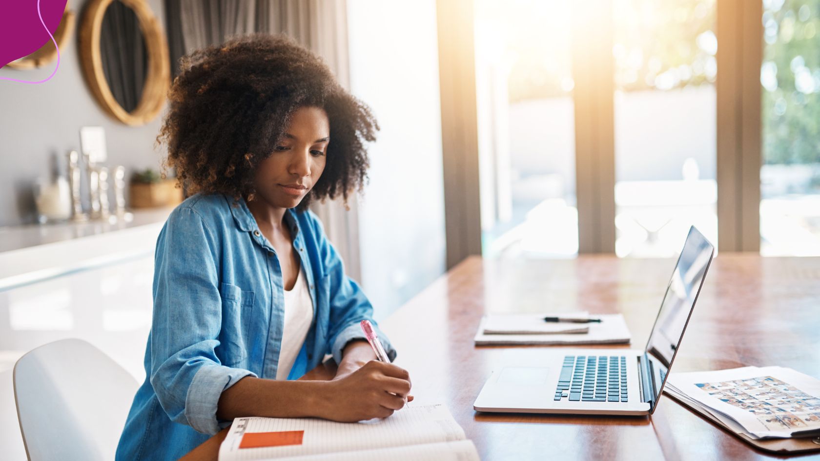 black woman sitting at desk