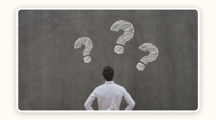 Man and question marks