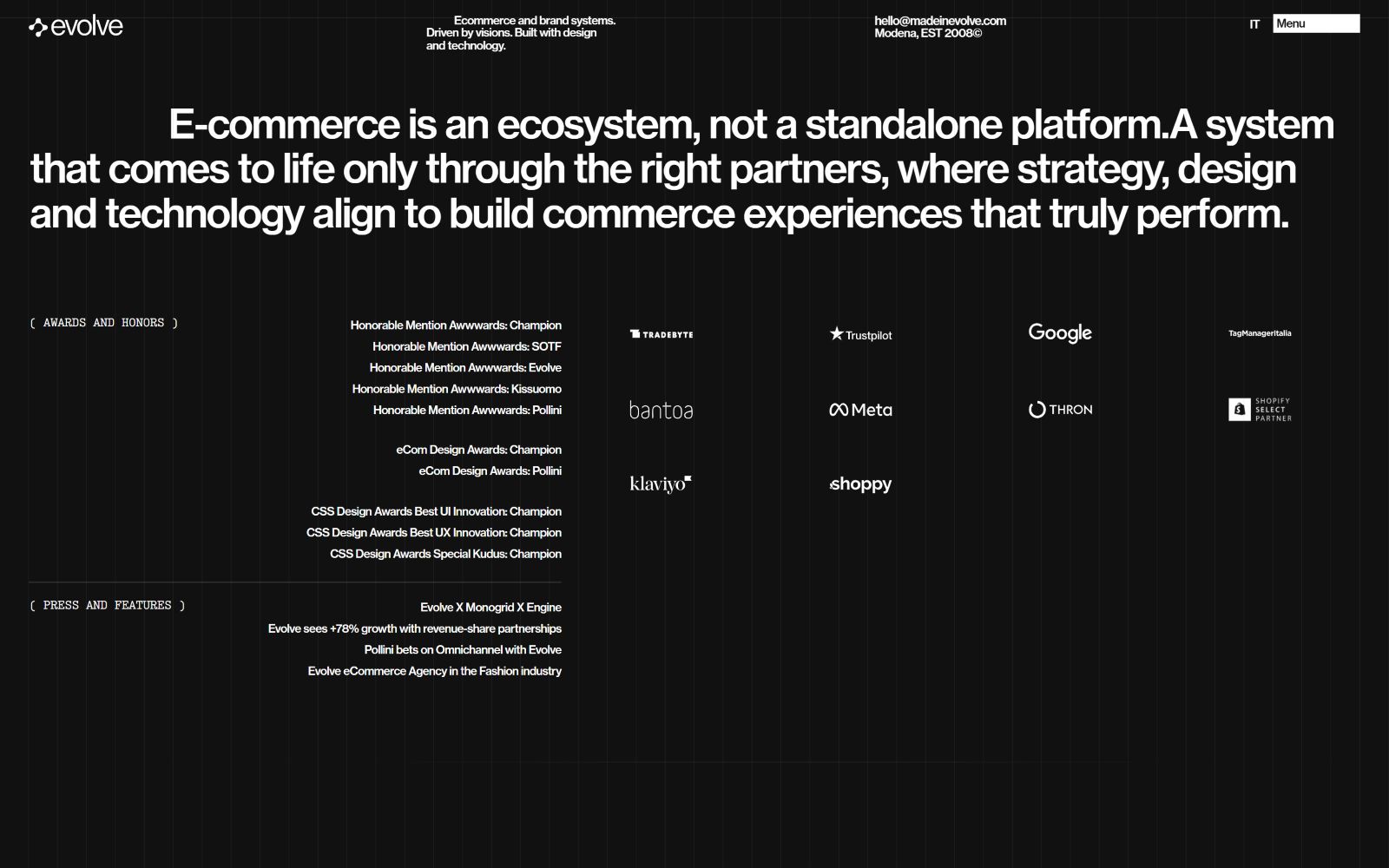 E-commerce message with award listings above partner logos like "Google," "Meta," and "Shopify," on a dark background.