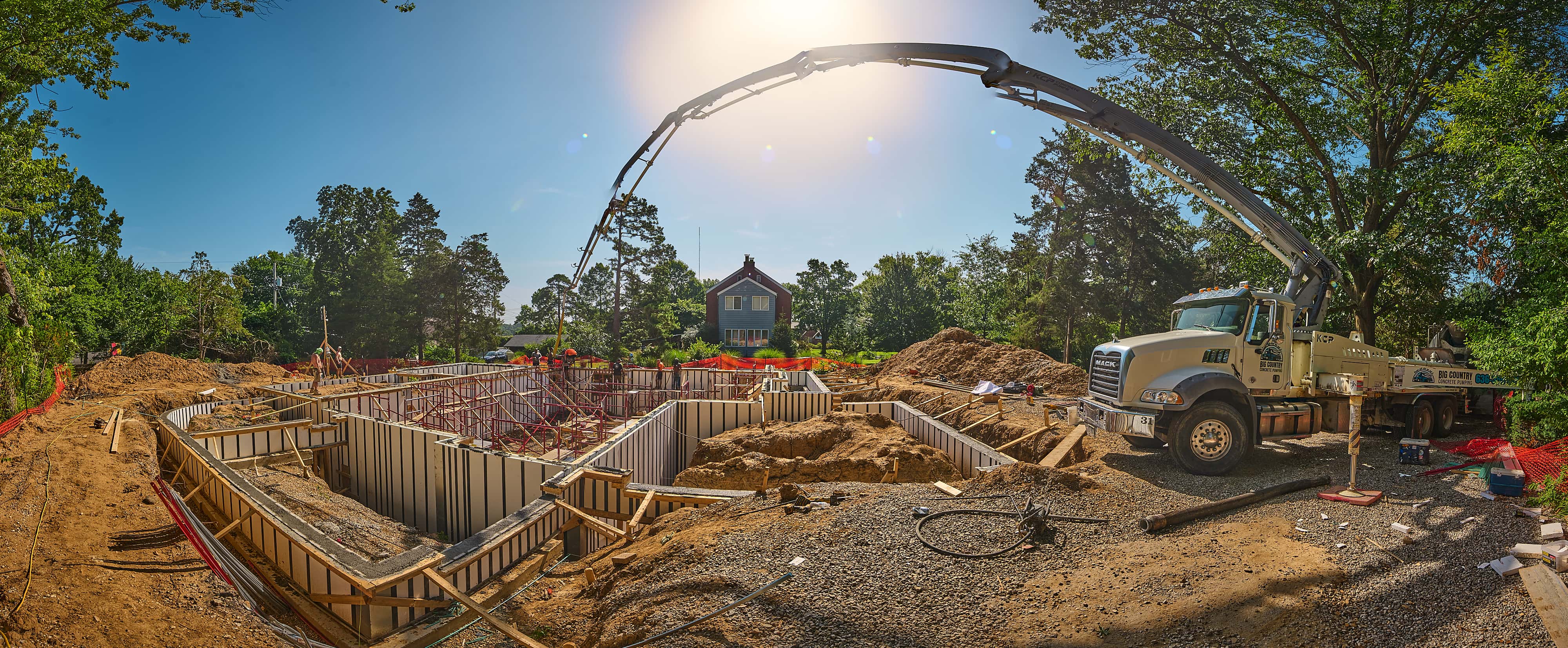 concrete truck with extension ready for a pour