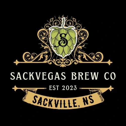 Smiling young woman with curly hair sitting at a laptop, in front of a teal wall.