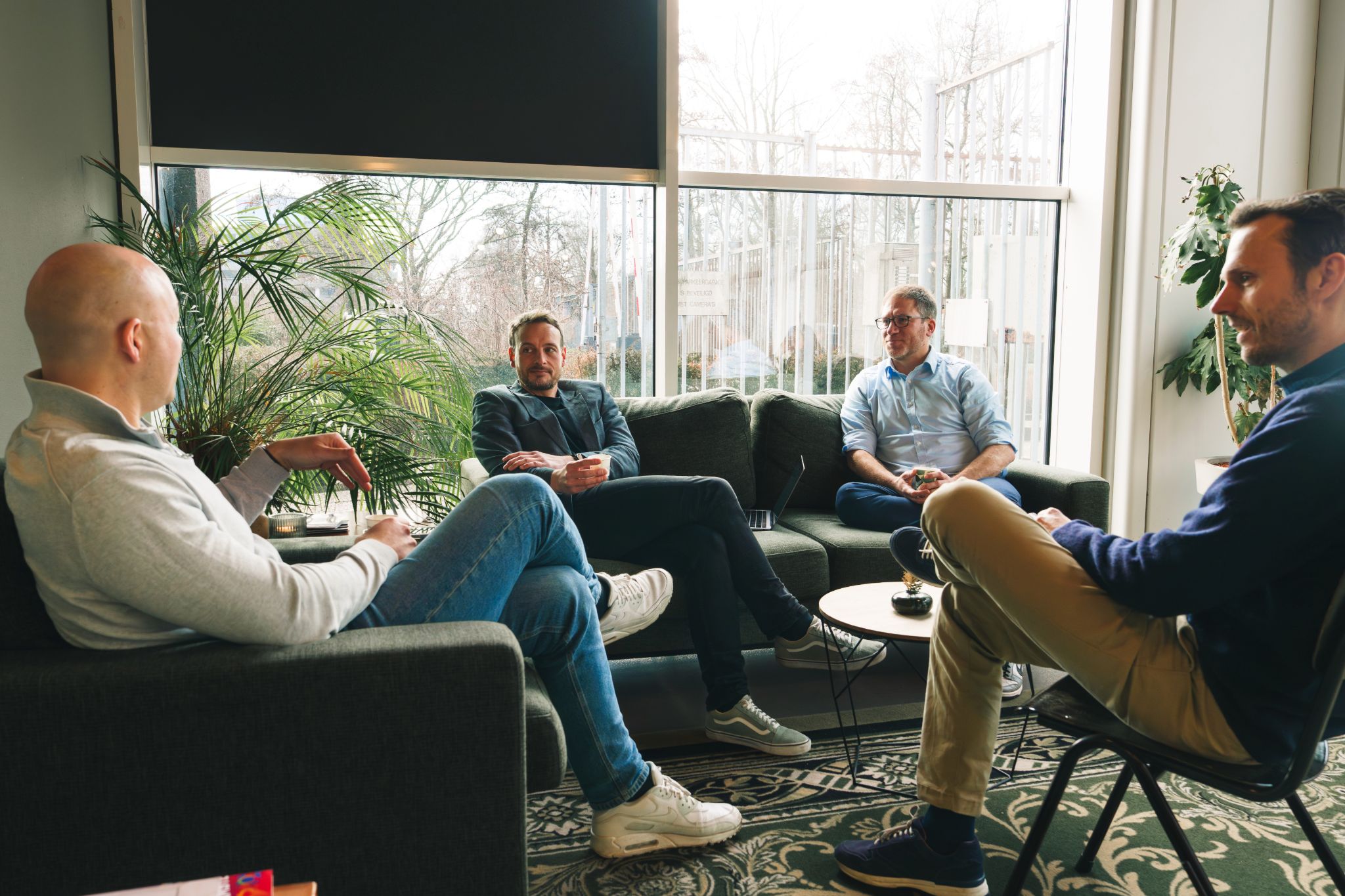 group of people using laptop computer