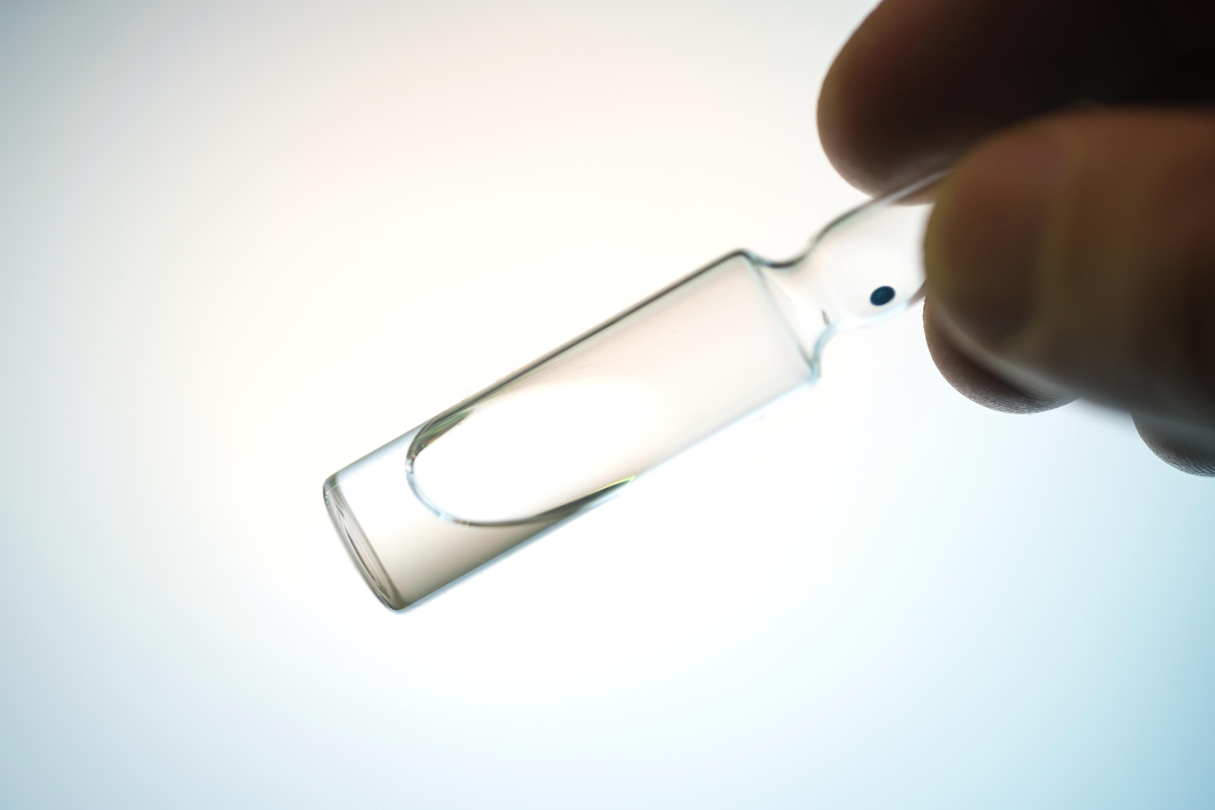 Two people having a picnic on the grass