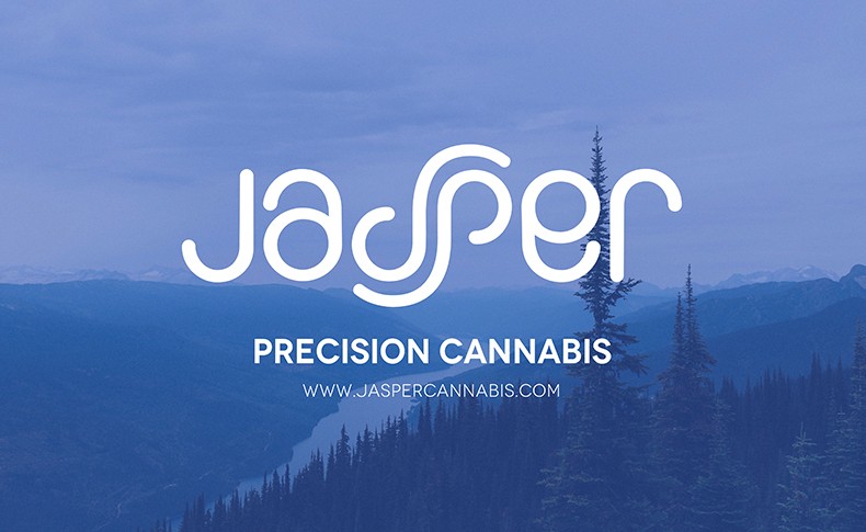 A blue line drawing diagram of the Jasper device, showcasing its five components: Grinder, Doser, Dose Nodules, Selector, and Smoking Device, all stacked vertically with the Joker logo on top.
