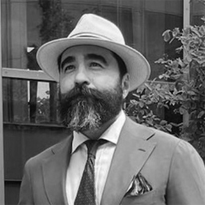 Elegant photo of Alan Spark with a hat