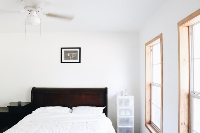 Home mattress on a plain white bed