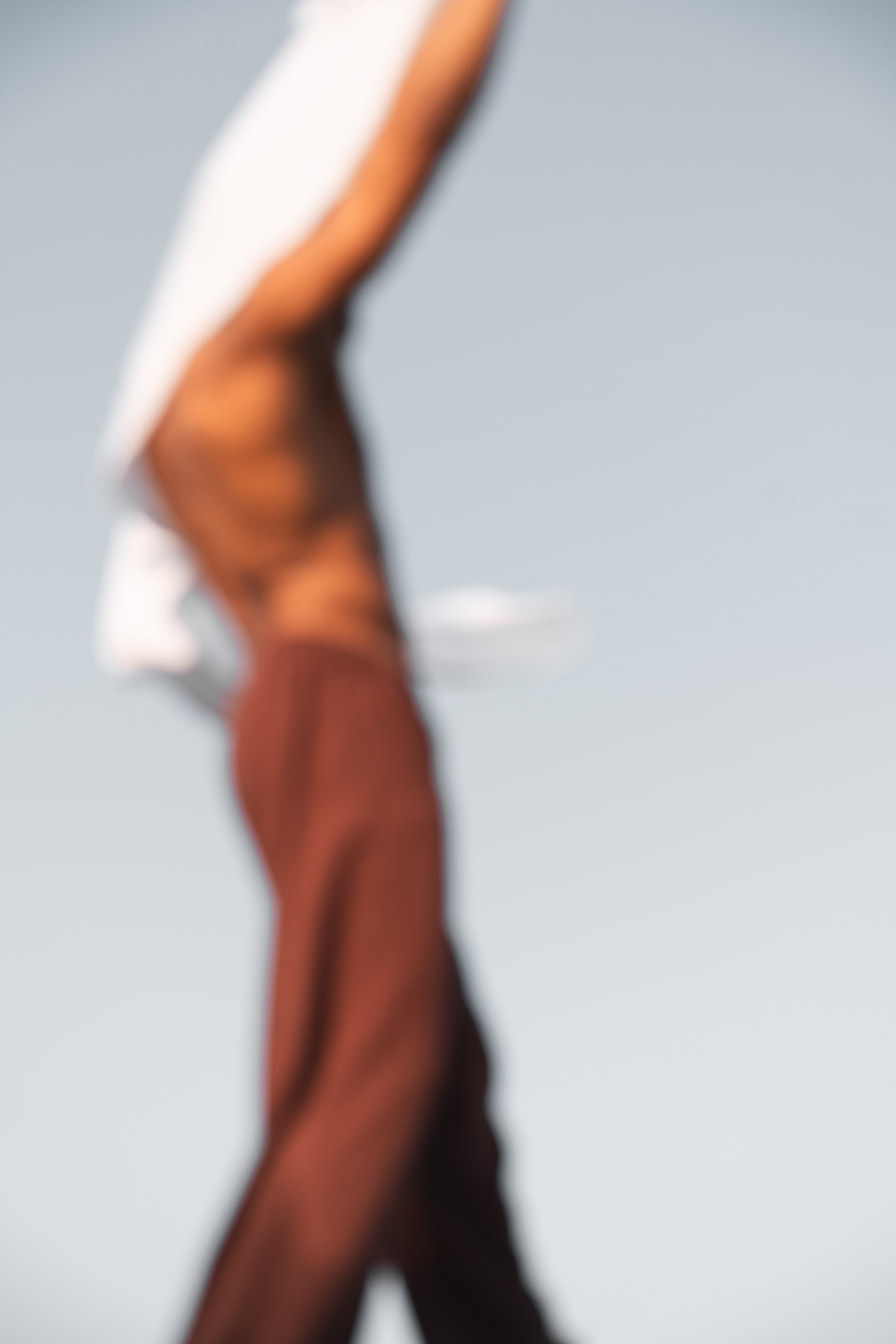 Close up of sandy girl body in bikini top