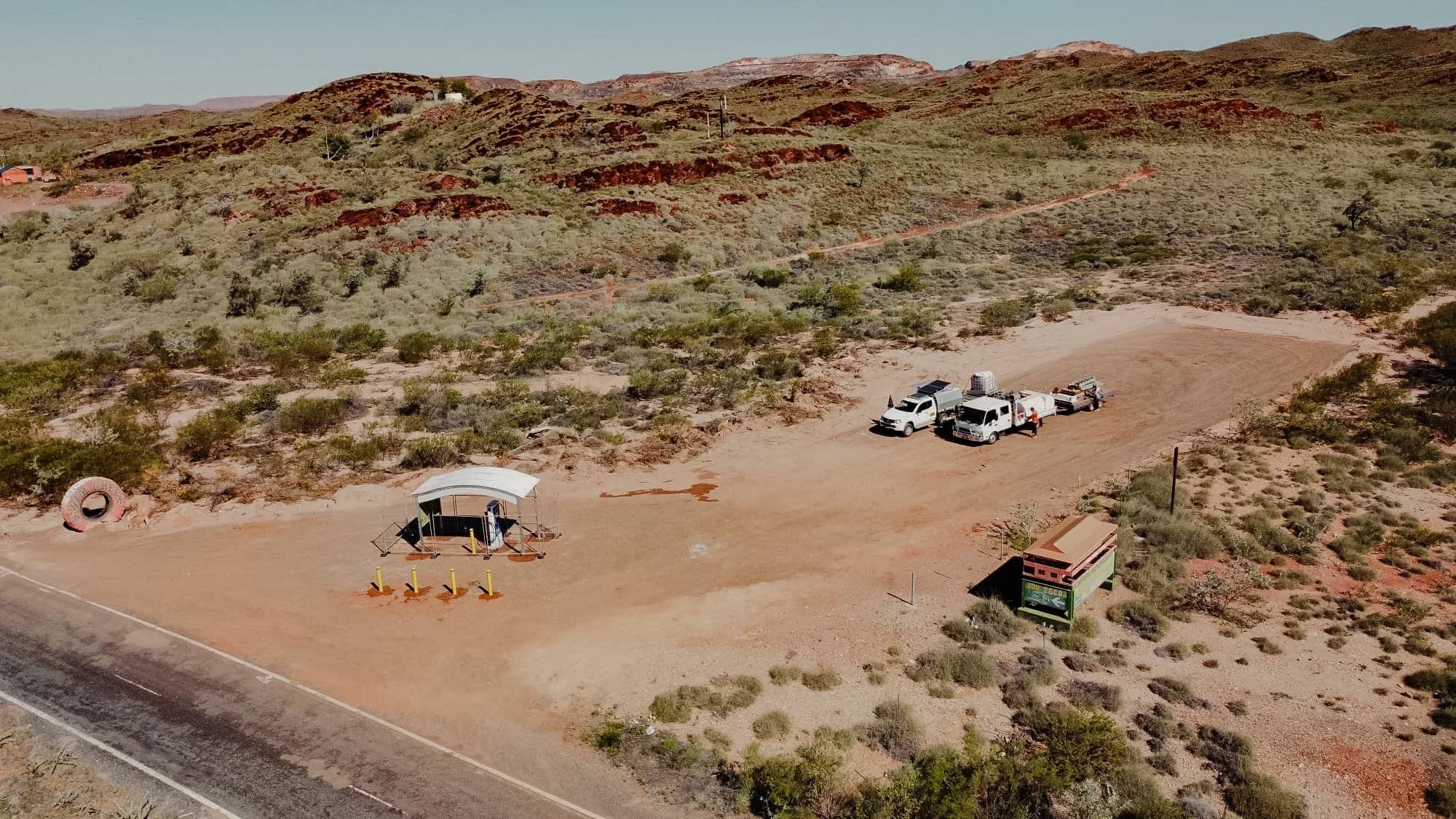 Powerhouse Renewables Group installation in remote Australian outback with vehicles and equipment