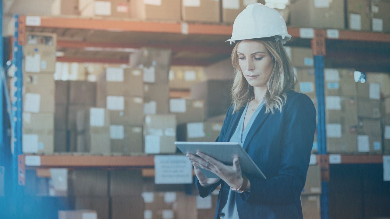 Factory worker on tablet