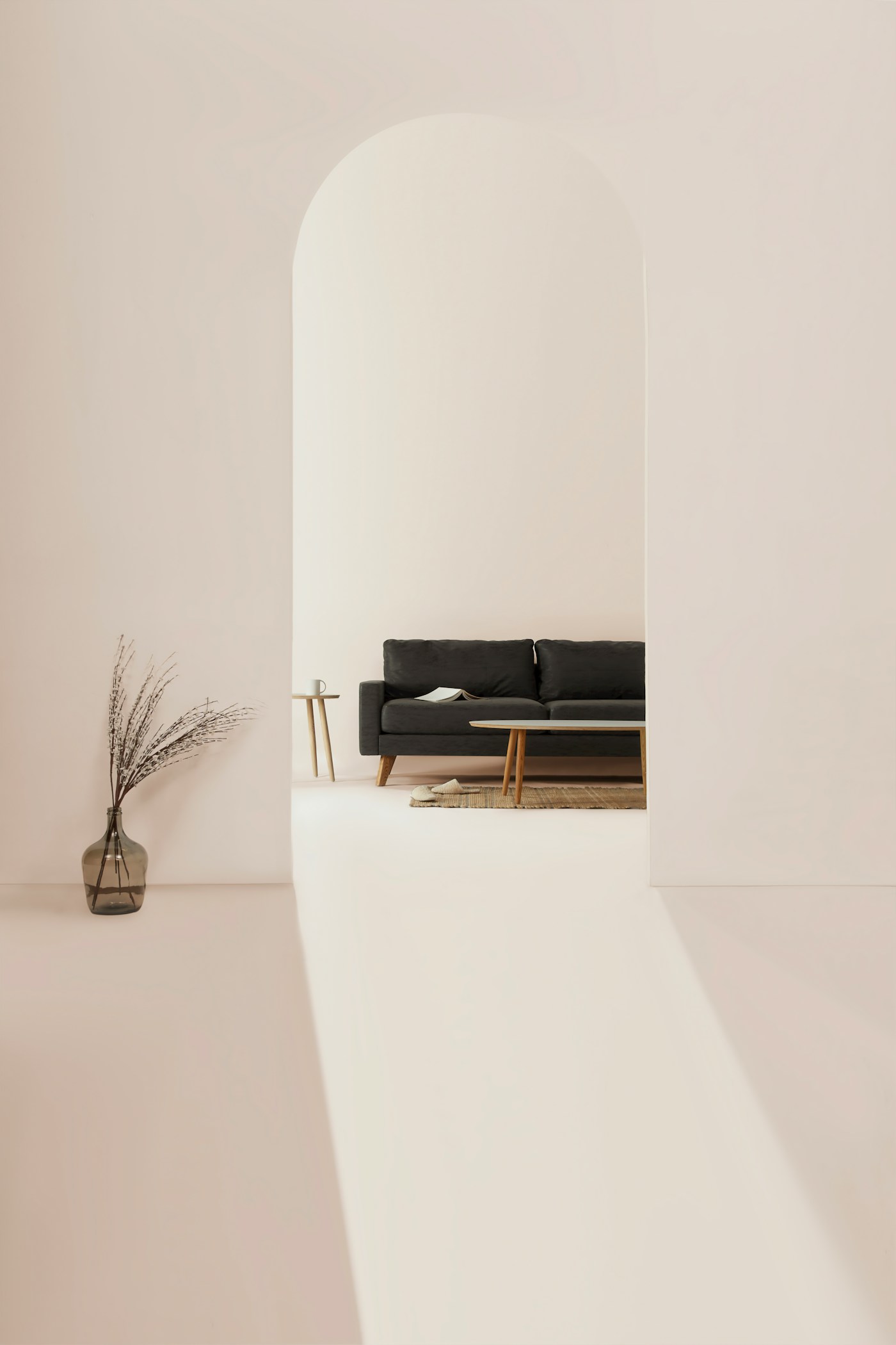 Arched alcove in cream plaster with a low dark sofa