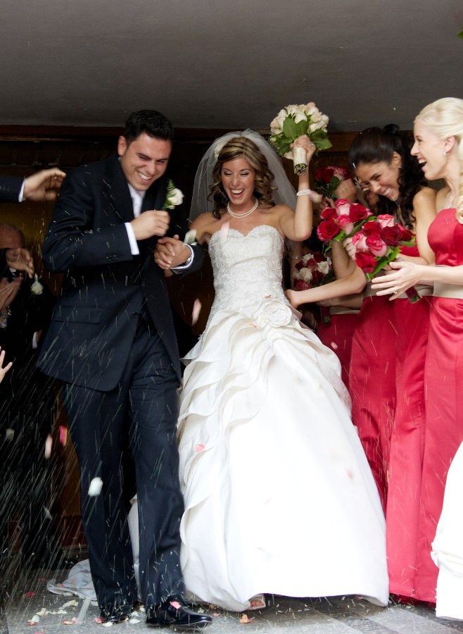 Bride and groom leaving church.
