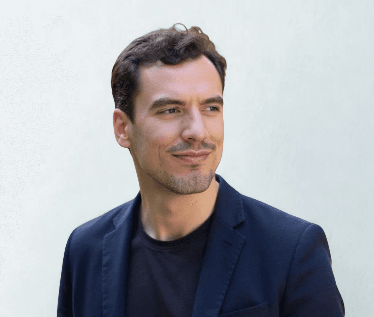 Man smiling in an office