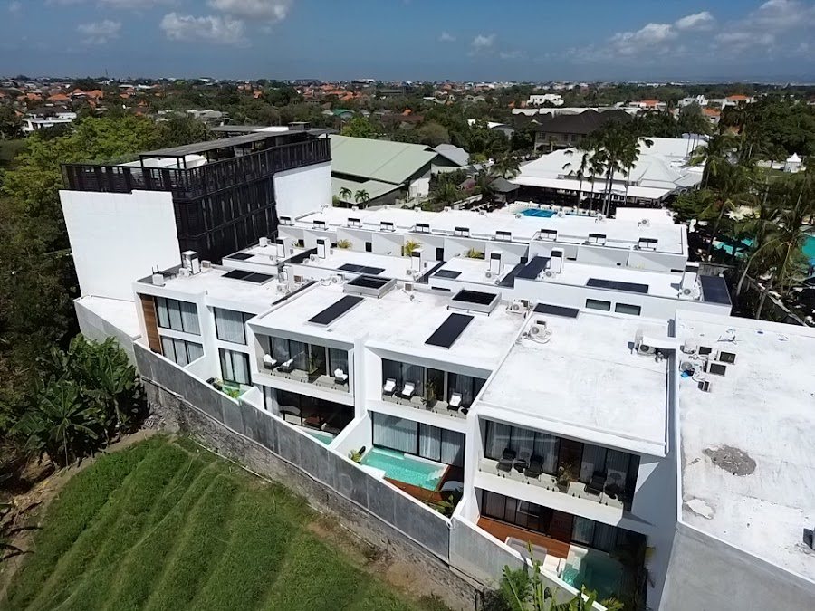 Completed Alex Villas Group complex among the rice fields of Canggu, Bali, seen from the air