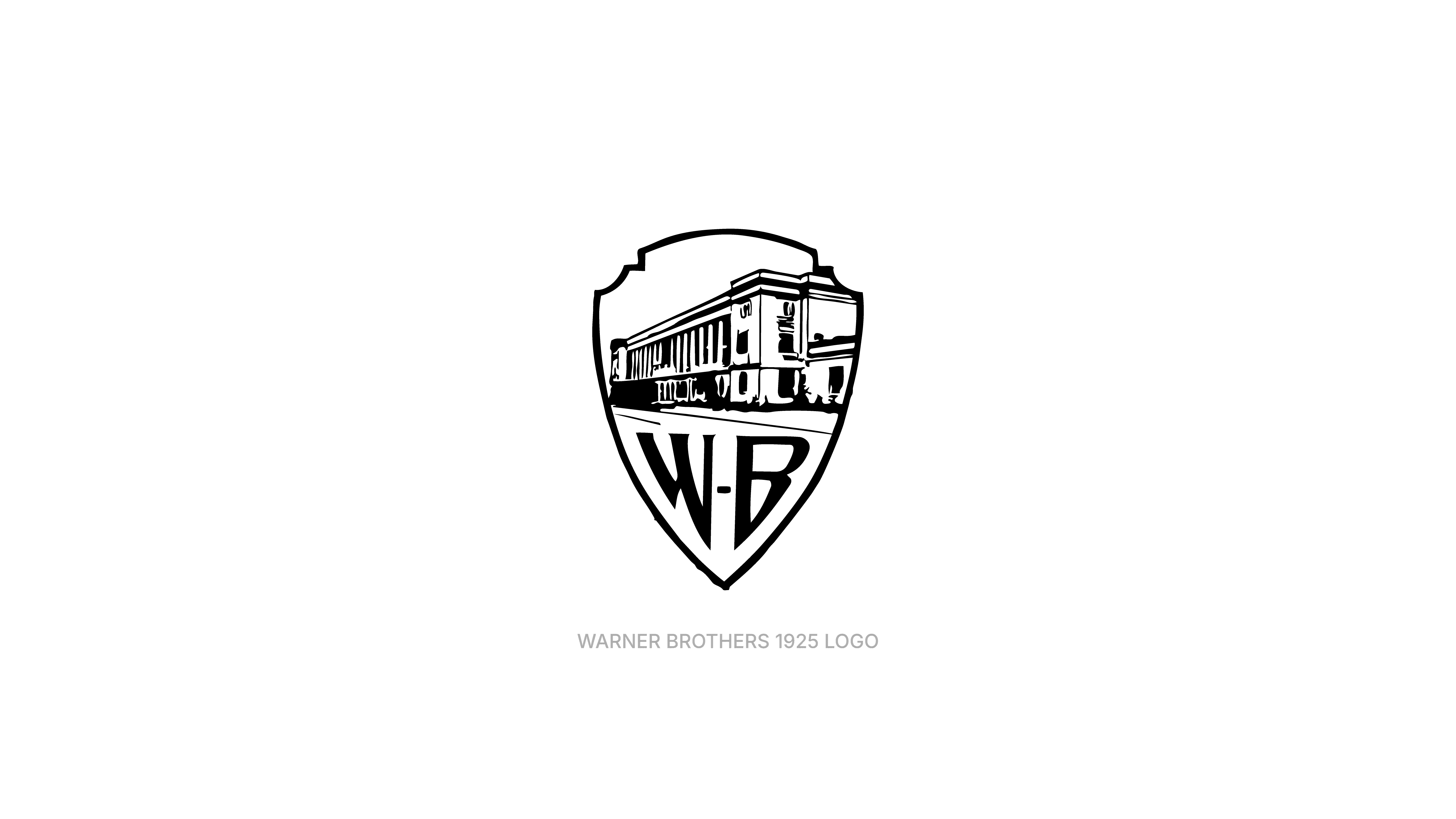 A vintage Warner Bros shield logo from 1925 in black and white, featuring a WB monogram and an illustrated studio building inside the crest.