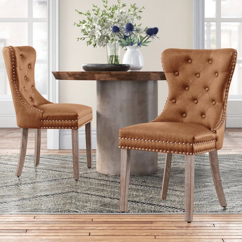 Experience superior quality with the leather wingback dining chair, crafted for durability and style.