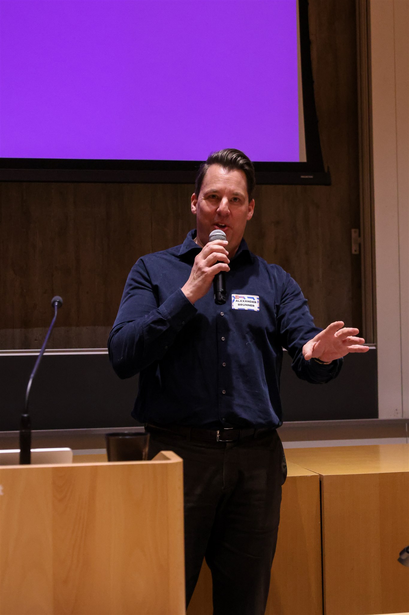 Speaker presenting ideas during EthereumZüri conference in Zurich