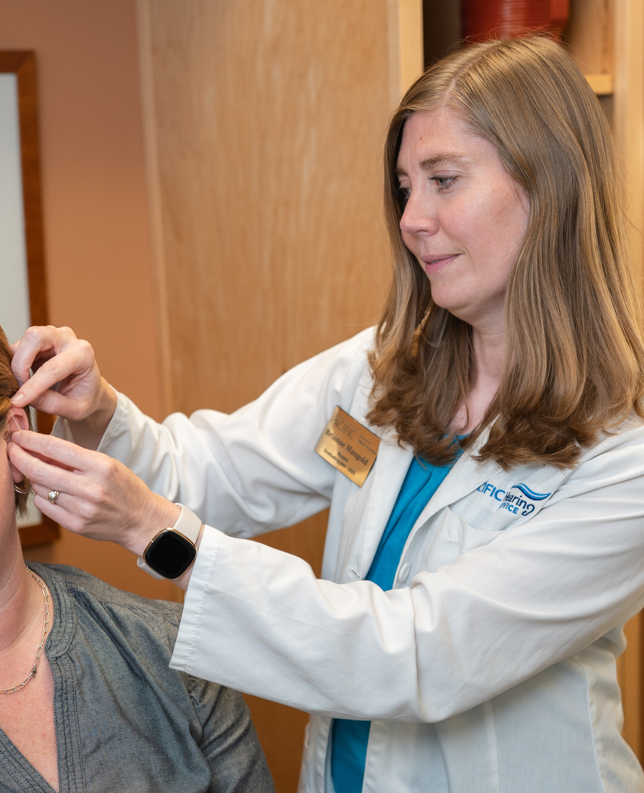 person in white shoes standing on gray concrete road