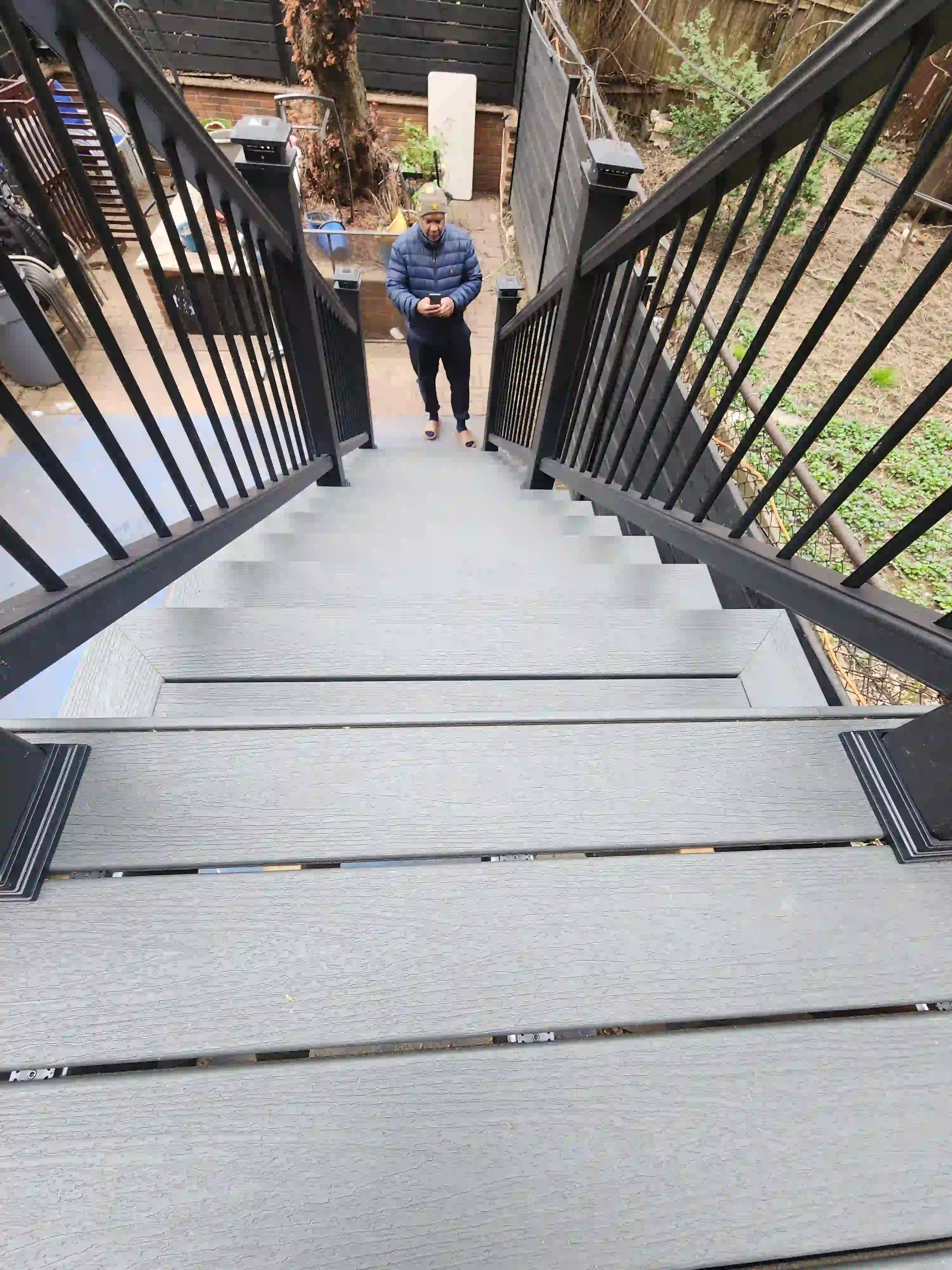 Stair View of a backayrd Trex Clam Shell Deck in Bed-Stuy Brooklyn transformed by Jewel Construction