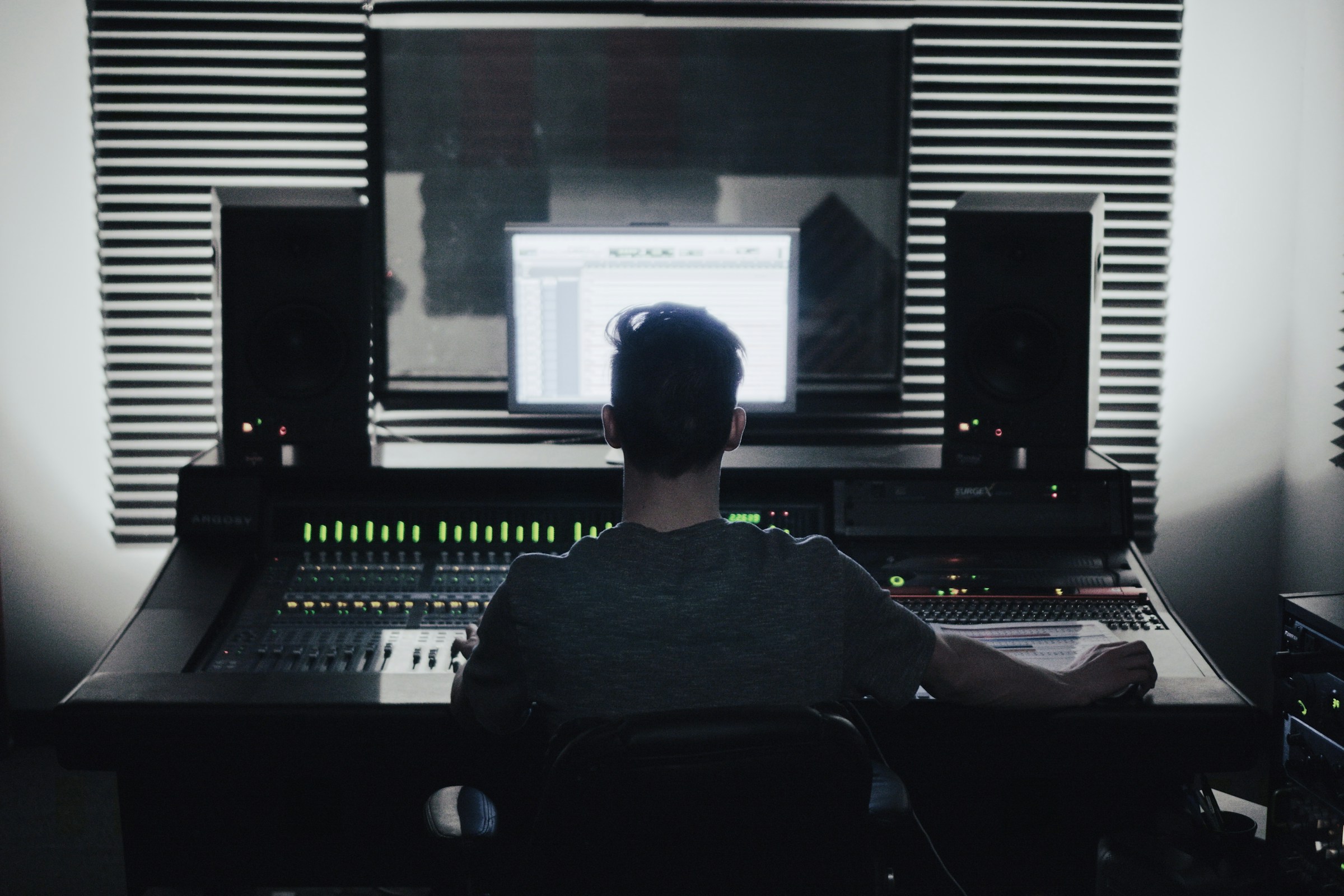 man in his studio - Benefits of Creating Music Online