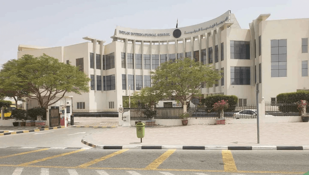 Large Semmer Villas building with numerous windows, showcasing a modern architectural design.