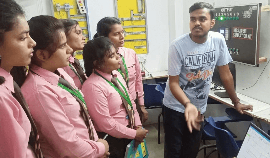 Full moon rising behind a house at night