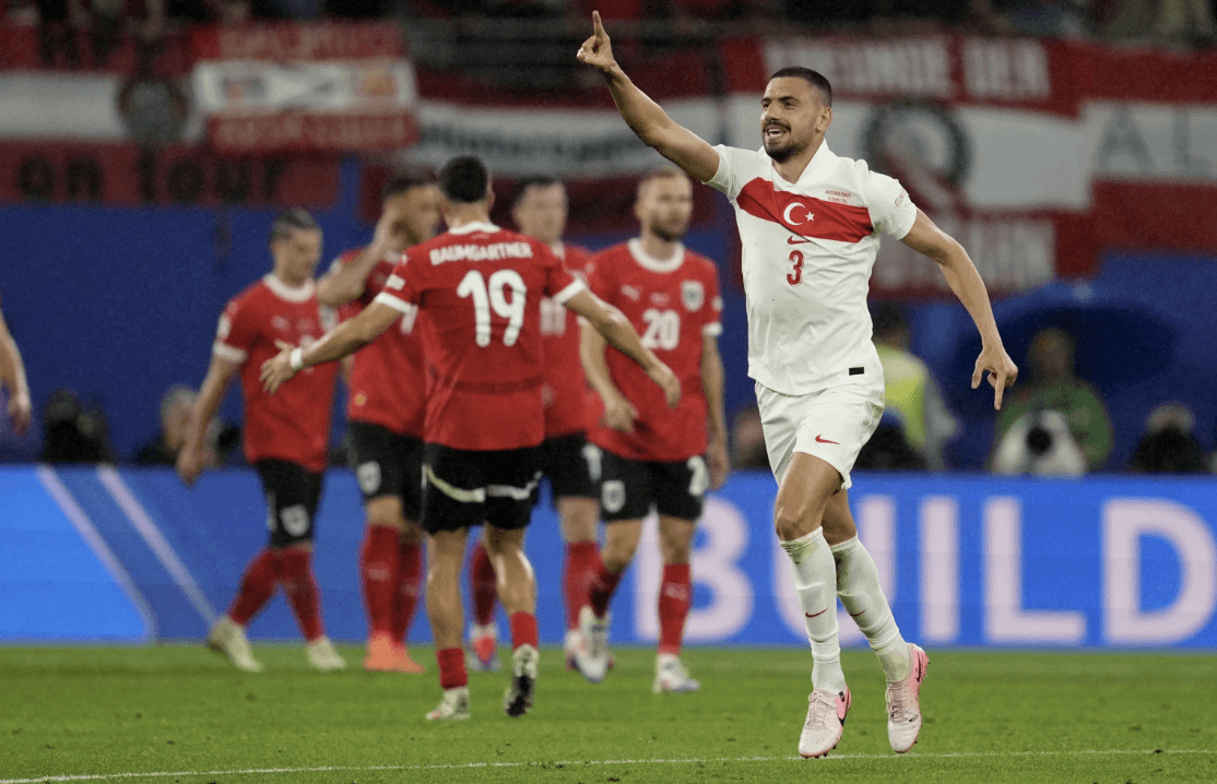 Merih Demiral (right), from Turkey’s team, celebrates his team’s win against Austria. (Photo Courtesy of AP News)