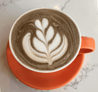 Outdoor Café Seating in a Sunlit Alley