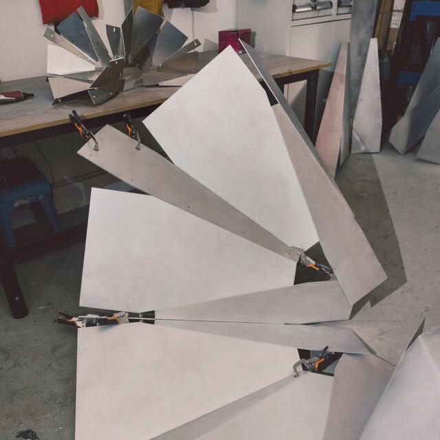 a man holding a cocktail