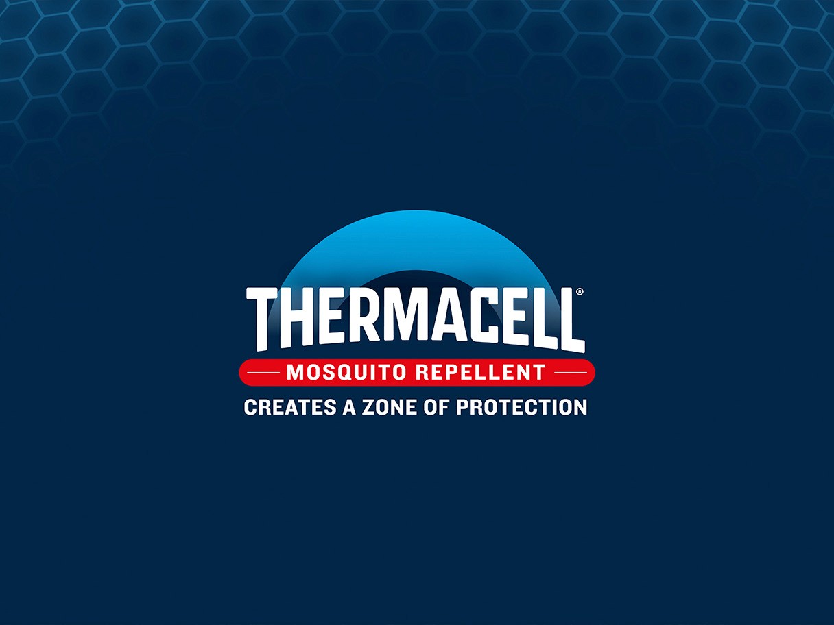 Rustic cabin in a golden field at sunset