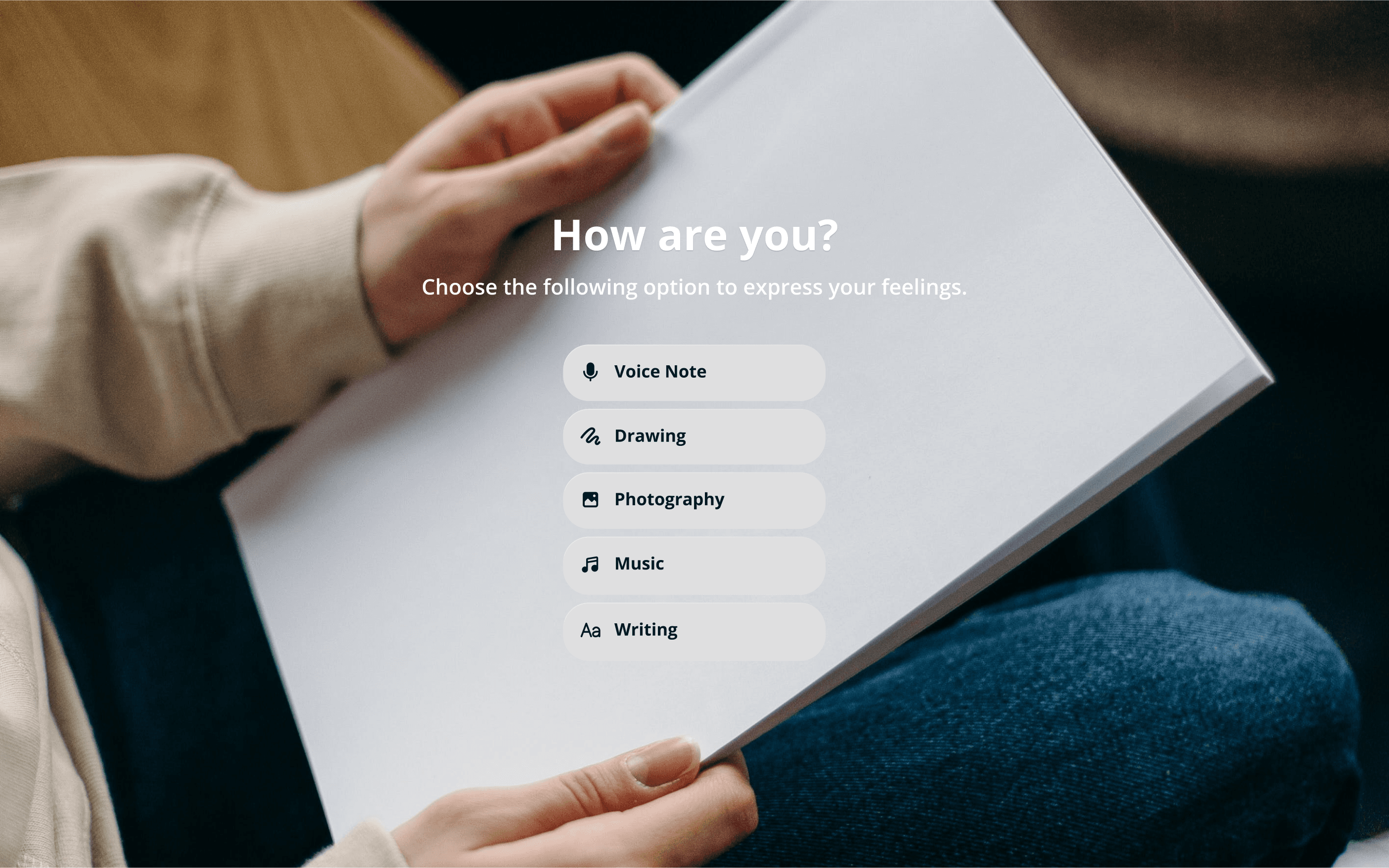 person holding a diary with user interface asking how are you