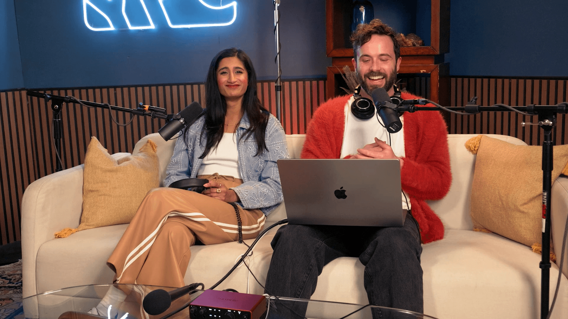 a laptop computer sitting on top of a desk