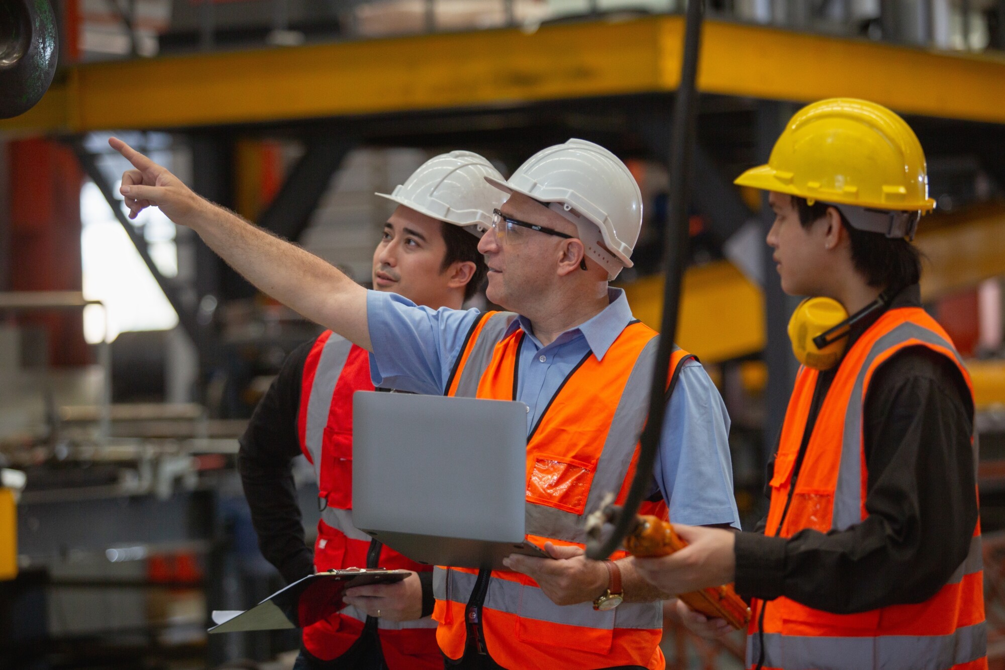 Senior staff member teaching technical training
