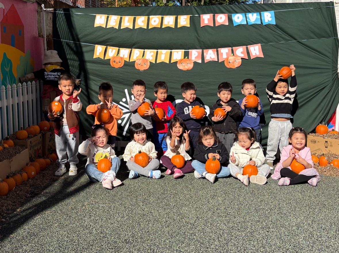 Preschoolers at their school pumpkin patch.