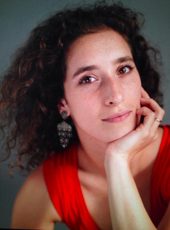 woman in white crew neck shirt smiling