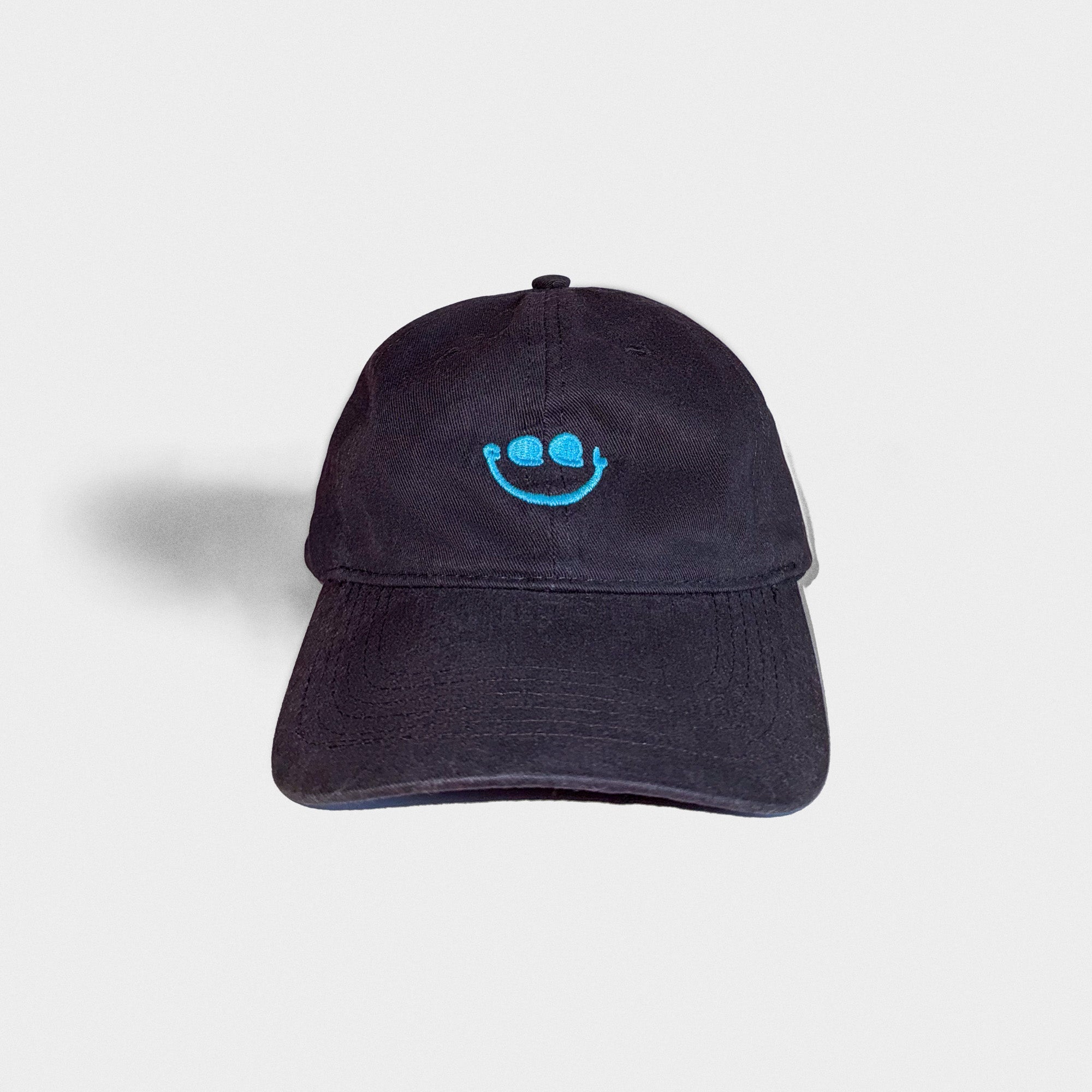 Black cap with a blue CQQL Records smiley face logo on a light gray background