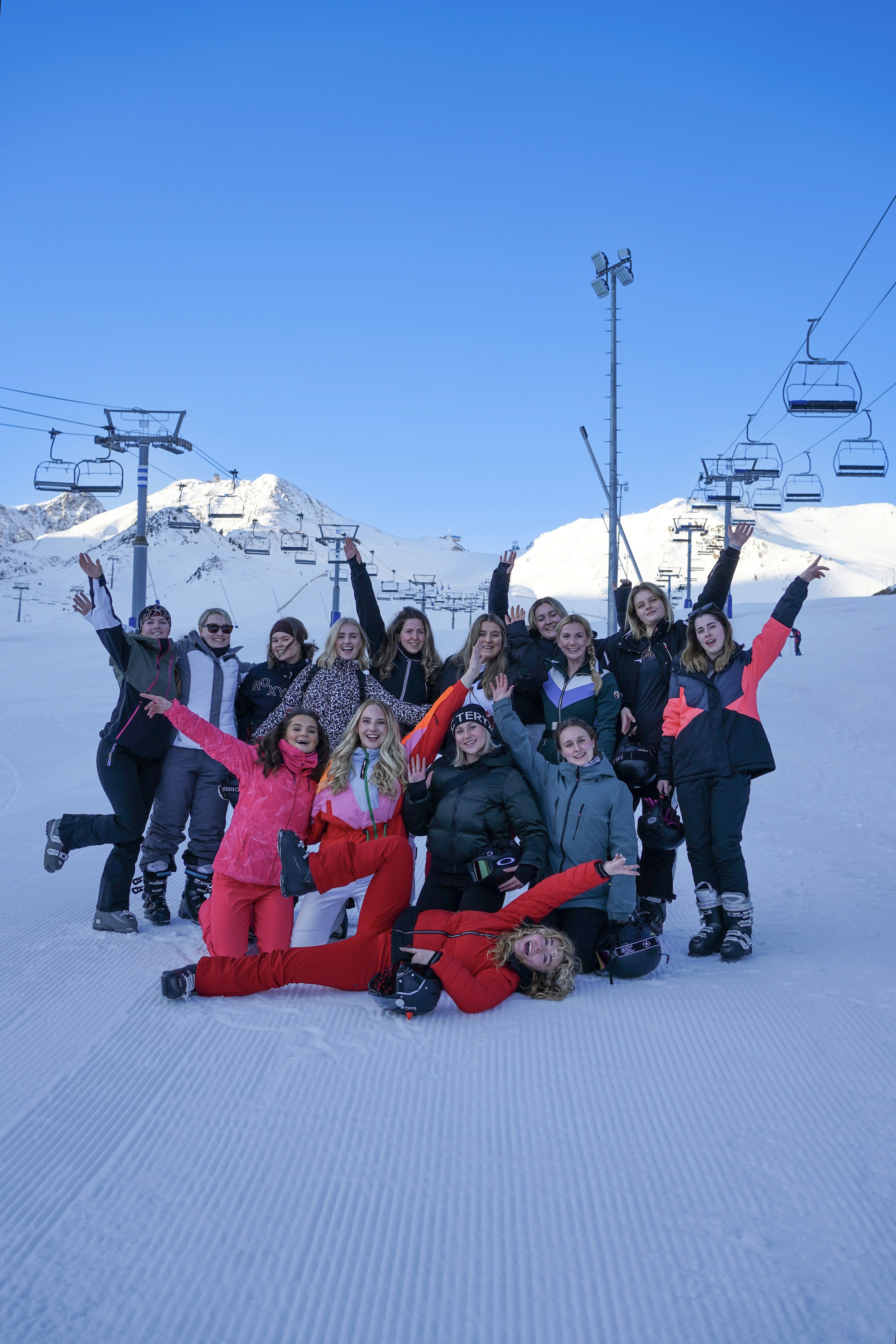 Off the Norm community celebrating freedom on a snowy mountain, embodying connection, adventure, and joy.