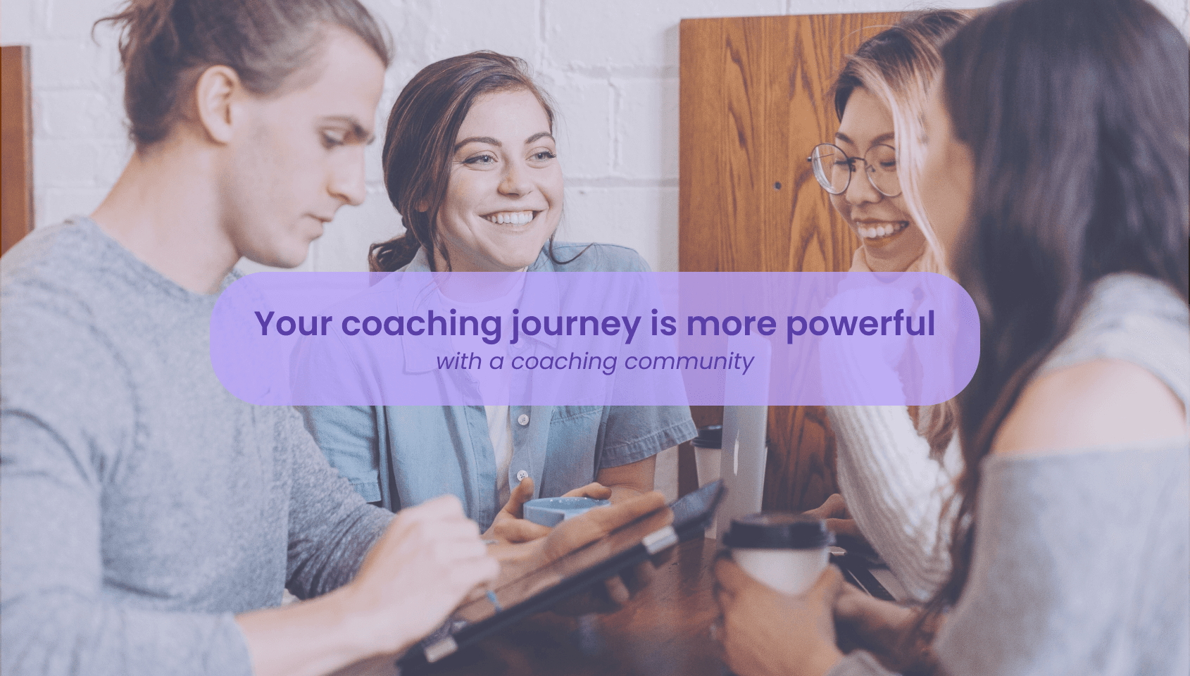 A group of happy people having coffee and chatting with each other reflecting the aspects of thriving online coaching community.