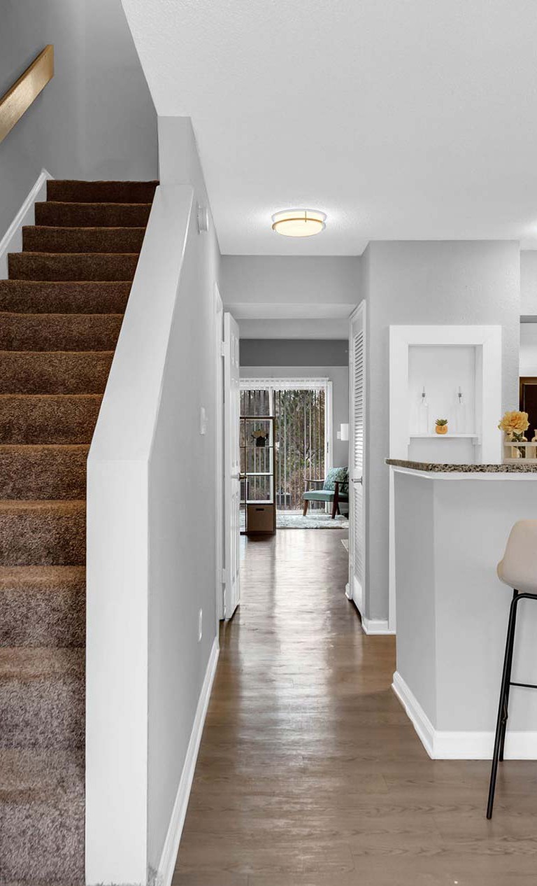 Staircase and Dining Area