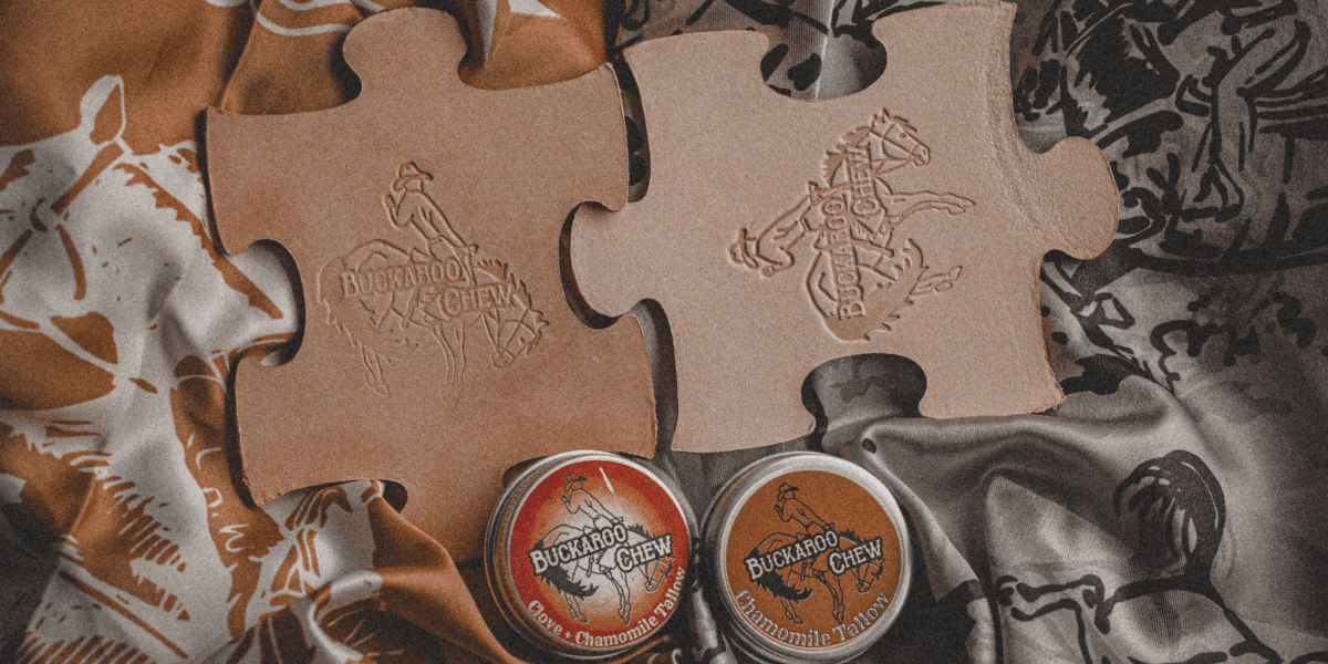 "Buckaroo Chew teething toy, featuring natural vegetable-tanned leather and chamomile-infused beef tallow, offering toxin-free relief for babies."
