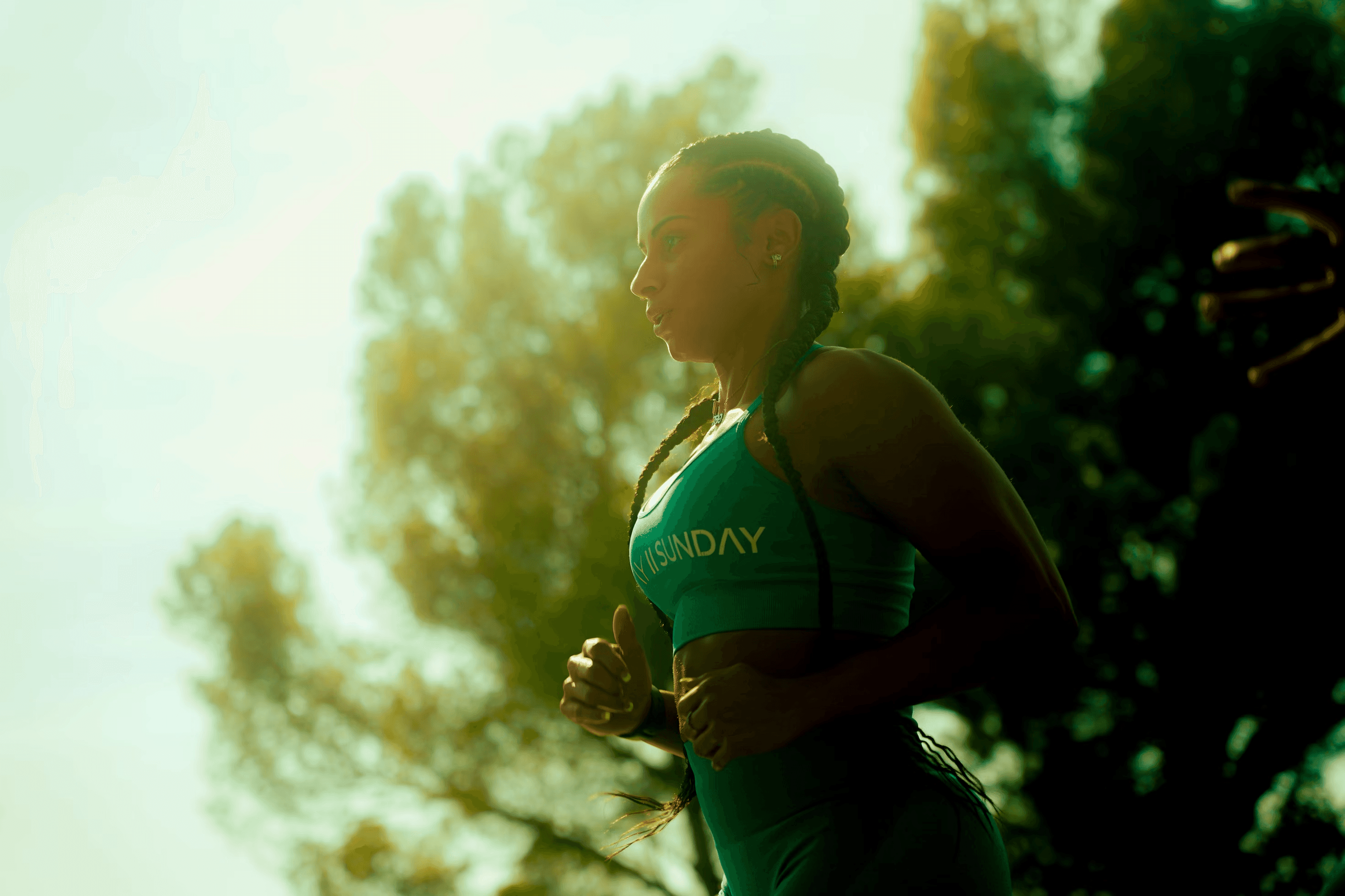 Woman running with sunset