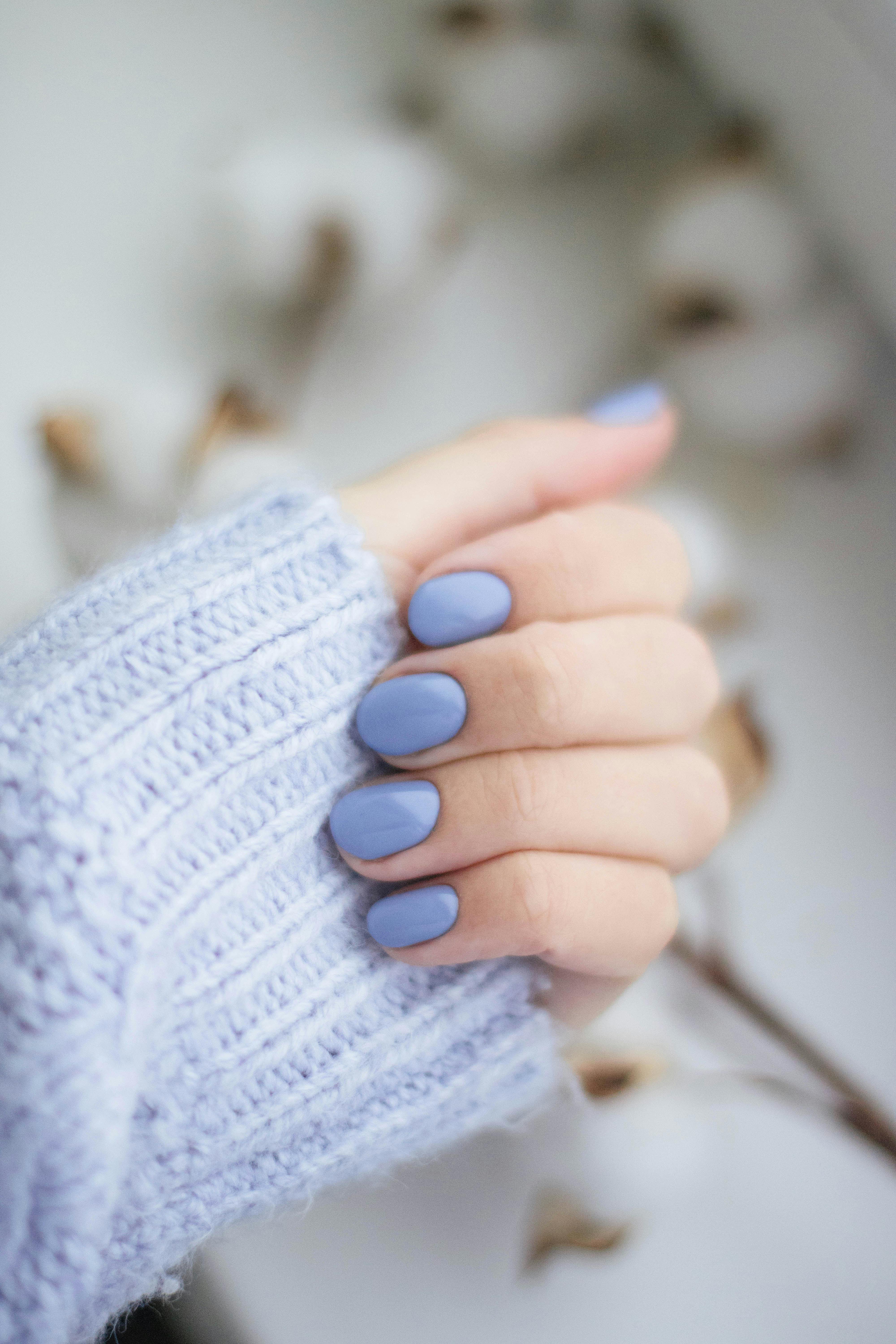 Short gel manicure with matte blue finish at nail salon near Naperville
