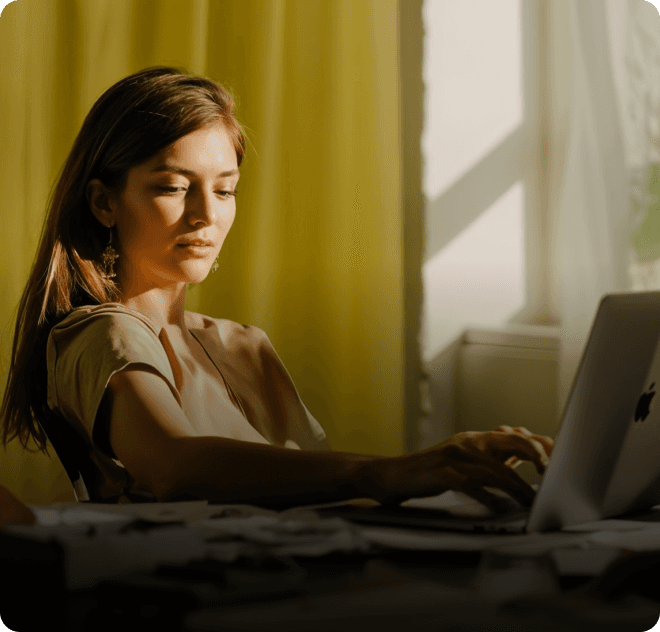 business setup companies in dubai - women using tab