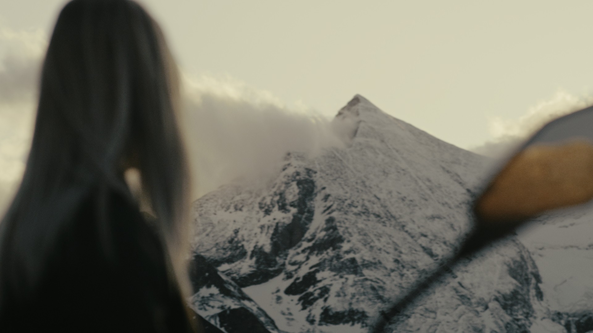 A mockup for a Macbook place on a table for a hair salon website